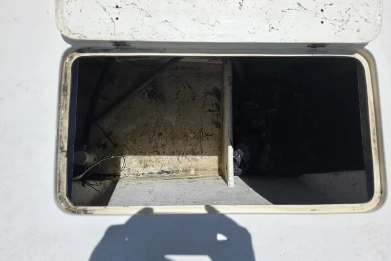 Slide: The Image of Open hatch on 2014 Custom Exuma Catamaran 32, showing interior compartment. - 50