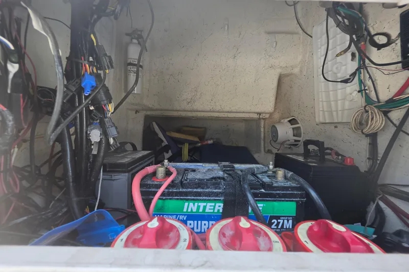 Slide: The Image of Interior of a 2014 Custom Exuma Catamaran 32 with batteries and equipment. - 62