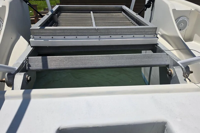Slide: The Image of Open hatch on 2014 Custom Exuma Catamaran 32, featuring JL Audio speaker. - 64