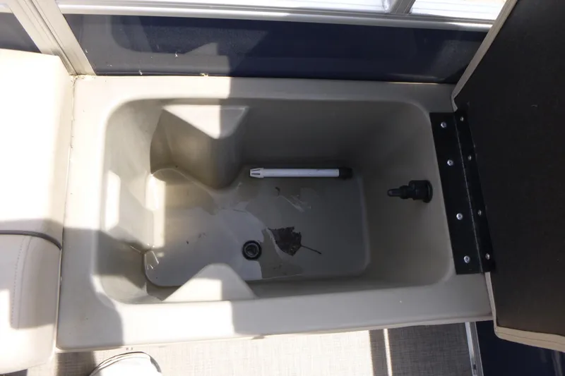 Slide: The Image of Livewell compartment in 2025 Sun Tracker Fishin' Barge 22 DLX pontoon boat. - 14