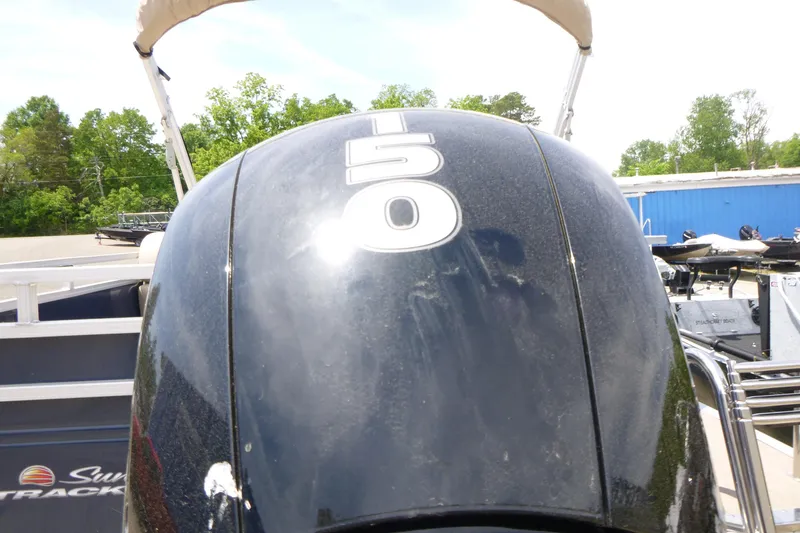 Slide: The Image of Outboard motor on 2025 Sun Tracker Fishin' Barge 22 DLX pontoon boat. - 15