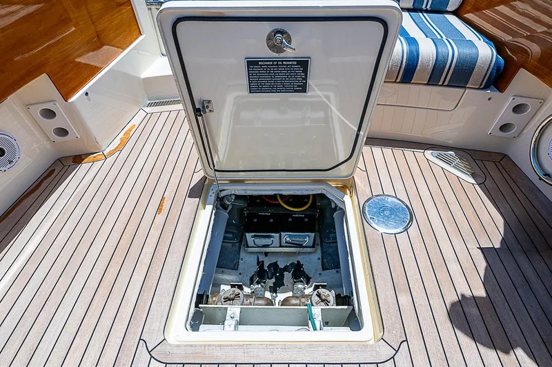 Slide: The Image of Open hatch on 2015 Hinckley Picnic Boat 37 MKIII, revealing engine compartment. - 22