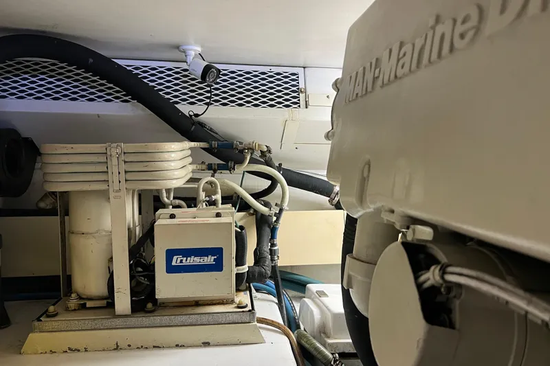 Slide: The Image of Engine room of 1999 Viking 60 CPMY with Cruisair system and MAN Marine Diesel. - 130