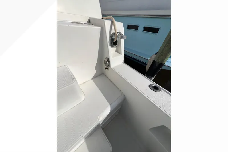 Slide: The Image of 1999 Viking 60 CPMY yacht deck with seating and fixtures. - 16