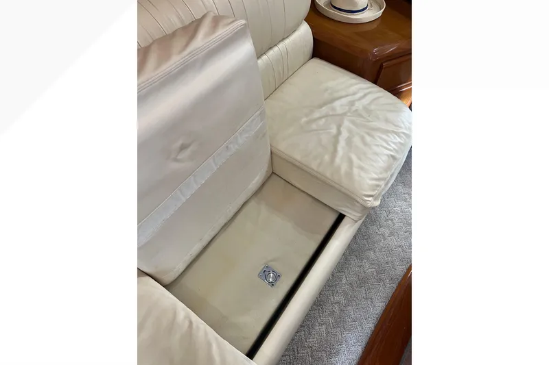 Slide: The Image of Cream leather seating on 1999 Viking 60 CPMY yacht interior. - 68
