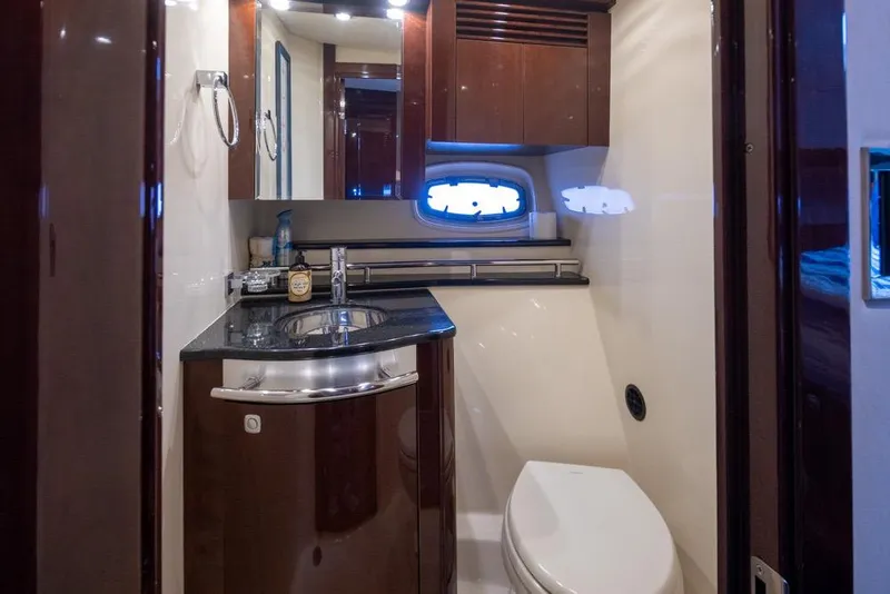 Slide: The Image of Luxurious bathroom interior of 2010 Sea Ray 500 Sundancer yacht with modern fixtures. - 24