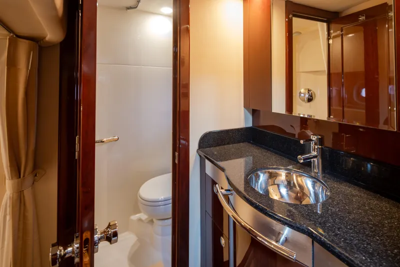 Slide: The Image of Luxurious bathroom interior of 2010 Sea Ray 500 Sundancer yacht with sleek design. - 29