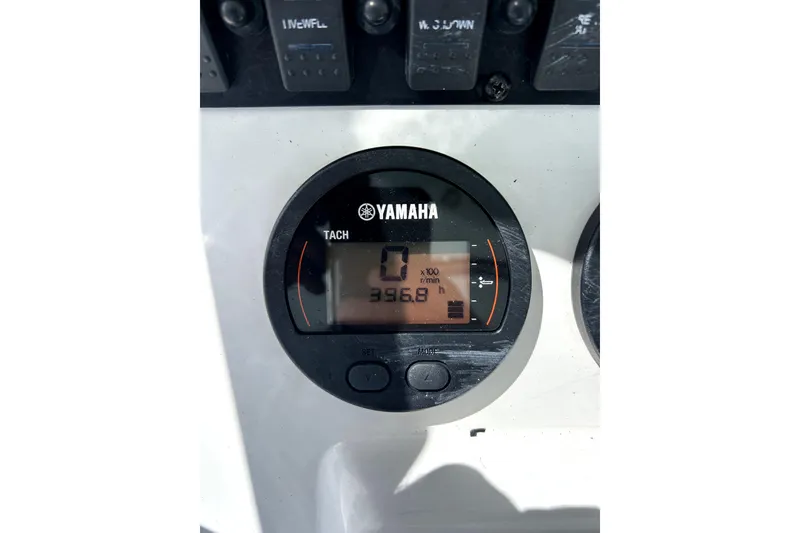 Slide: The Image of Yamaha tachometer on 2017 Sea Hunt Ultra 232 boat, displaying 396.8 hours. - 4