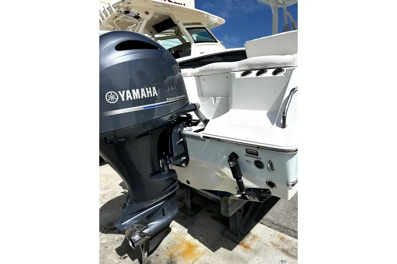 Slide: The Image of 2017 Sea Hunt Ultra 232 boat with Yamaha four-stroke outboard motor. - 7