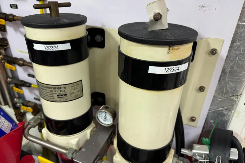 Slide: The Image of Fuel filter water separators in a 2003 Altima 55 Pilothouse engine room. - 66