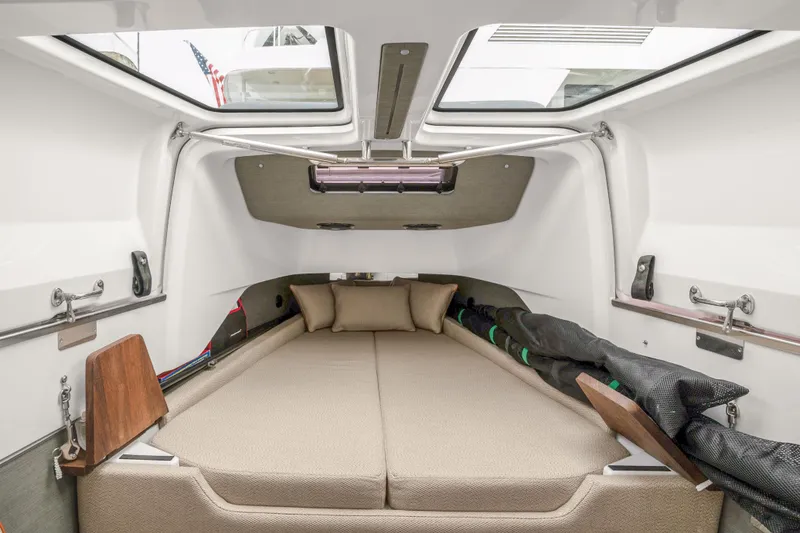 Slide: The Image of Interior cabin of 2021 Axopar 37 XC Cross Cabin with skylights and cushions. - 41