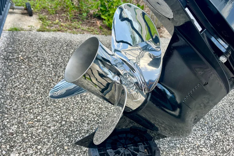Slide: The Image of Shiny propeller of 2023 Harris Cruiser 230 boat on textured surface. - 5