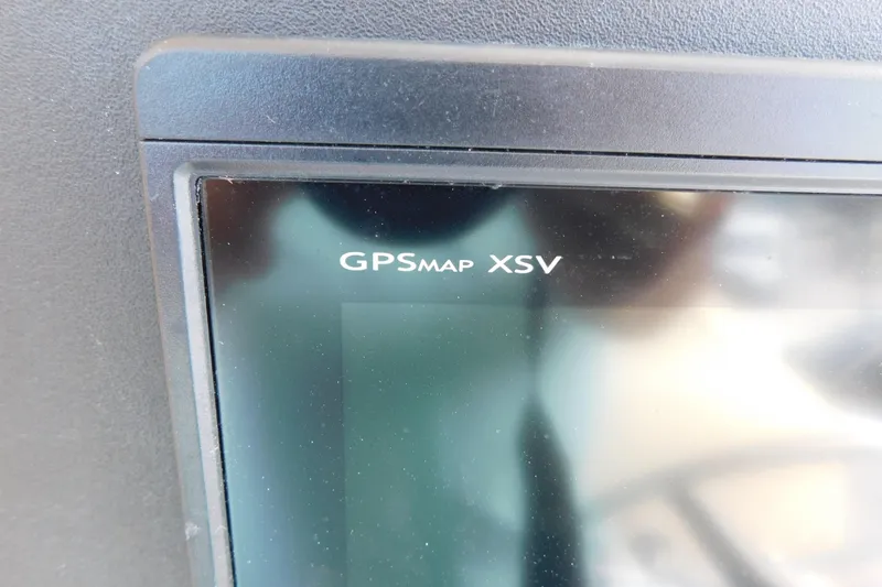 Slide: The Image of GPSMap XSV display on 1996 Regulator 23 Center Console boat dashboard. - 16