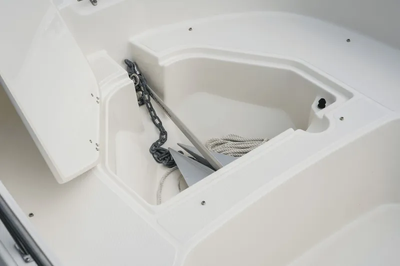 Slide: The Image of An anchor locker with anchor and rope on a boat. - 44