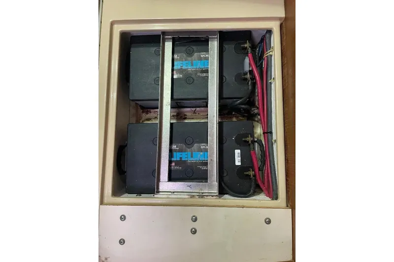 Slide: The Image of Battery compartment of 1994 Island Packet 44 cutter with Lifeline AGM batteries. - 120