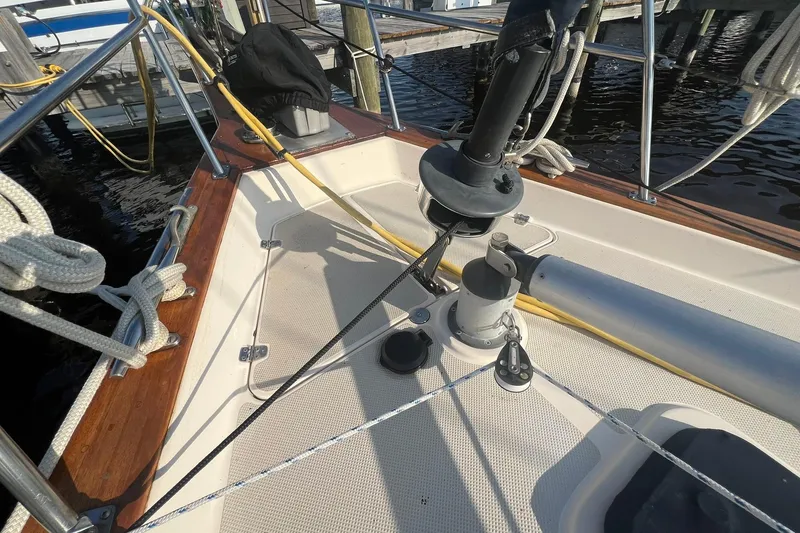 Slide: The Image of Deck of 1994 Island Packet 44 cutter sailboat with rigging and ropes. - 33