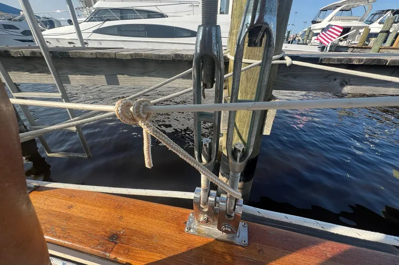 Slide: The Image of Close-up of rigging on a 1994 Island Packet 44 cutter at a marina. - 34