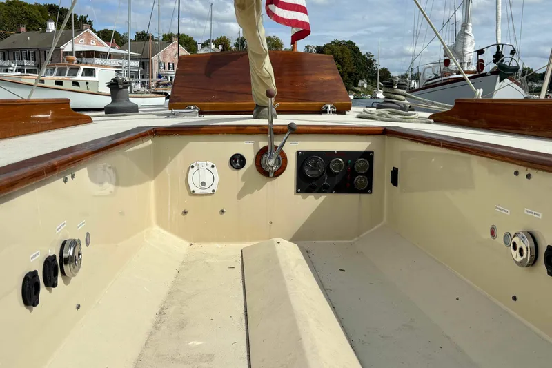 Slide: The Image of Interior of 1979 O.Lie-Neilsen 44 Cutter Rigged boat with wooden cabinetry and metal hardware. - 22