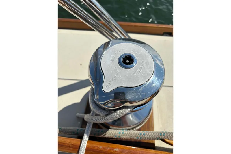 Slide: The Image of Navigation station on 1979 O.Lie-Neilsen 44 Cutter Rigged sailboat with charts and controls. - 25