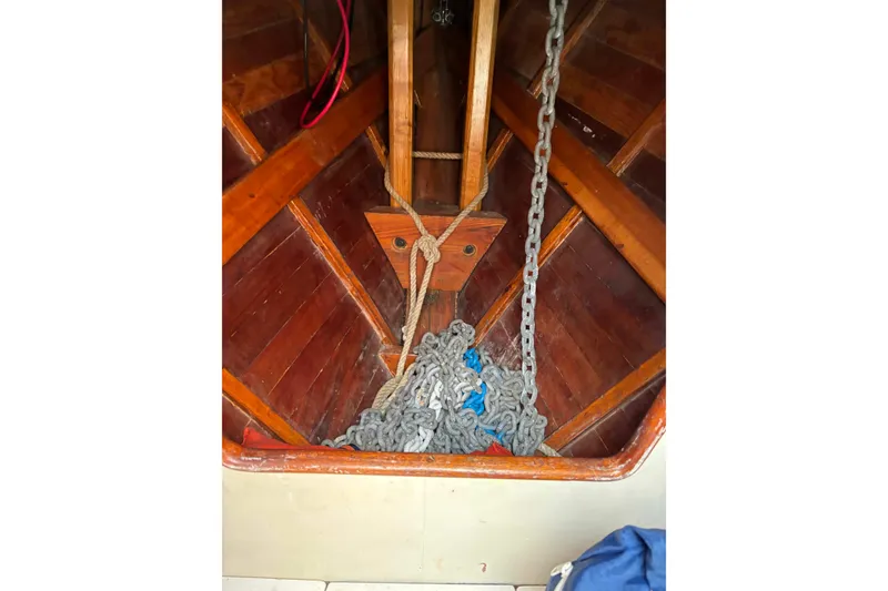 Slide: The Image of Interior of 1979 Nielsen 44 Cutter Rigged sailboat with ropes and chains. - 42