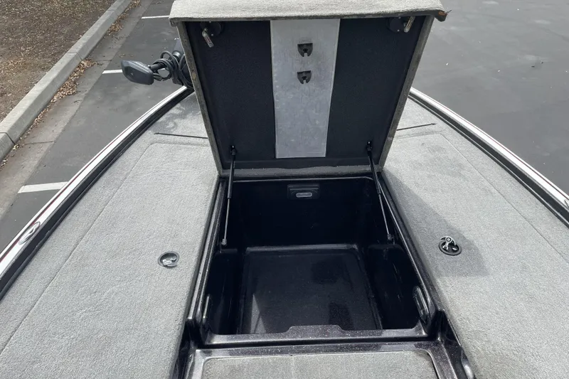Slide: The Image of Open storage compartment on a 2013 Nitro Z-8 boat, showcasing interior space. - 9
