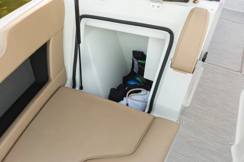 Slide: The Image of Storage compartment in 2016 Sea Ray SLX 250 boat. - 24