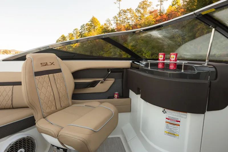 Slide: The Image of Interior of 2016 Sea Ray SLX 250 with beige seating. - 29