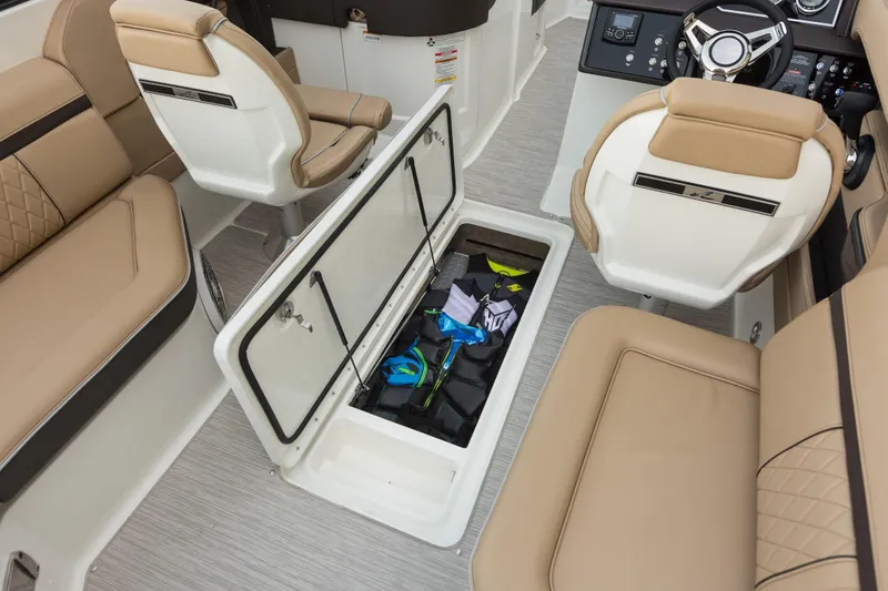 Slide: The Image of Interior of Sea Ray SLX 250 boat with storage compartment. - 32