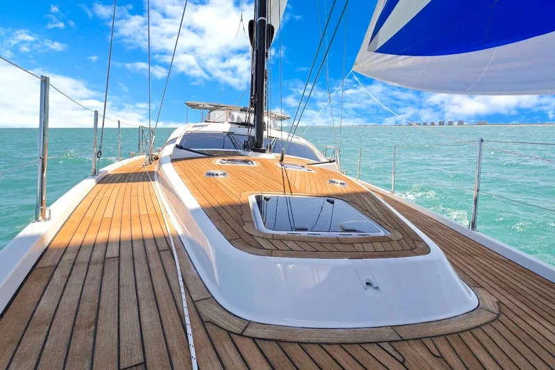 Slide: The Image of Luxurious 2011 Southerly 57 RS yacht sailing on clear blue waters under a vibrant sky. - 10