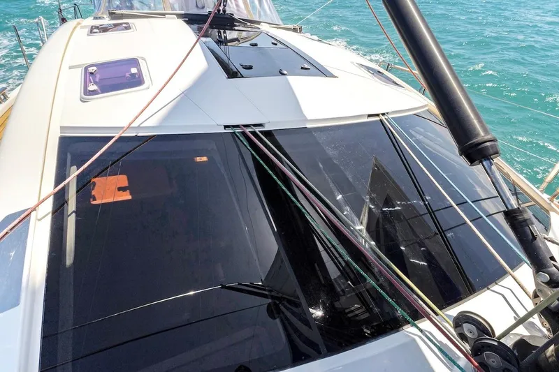 Slide: The Image of Sailing yacht Southerly 57 RS (2011) deck view with ropes and windows on turquoise sea. - 13