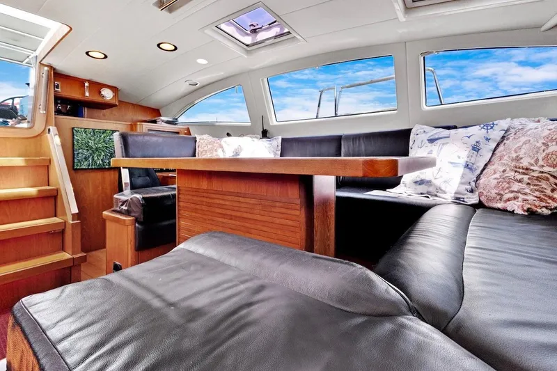 Slide: The Image of Luxurious interior of 2011 Southerly 57 RS yacht with leather seating and wooden accents. - 26