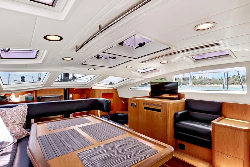 Slide: The Image of Luxurious interior of 2011 Southerly 57 RS yacht with modern seating and skylights. - 28