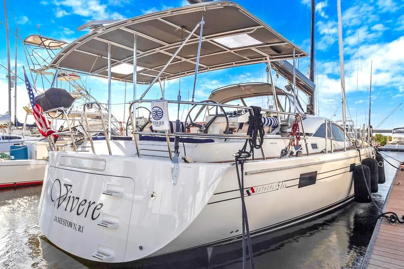 Slide: The Image of Sailing yacht Southerly 57 RS, 2011 model, docked at marina under clear blue sky. - 3
