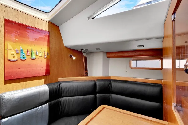 Slide: The Image of Luxurious interior of 2011 Southerly 57 RS yacht with modern decor and leather seating. - 39