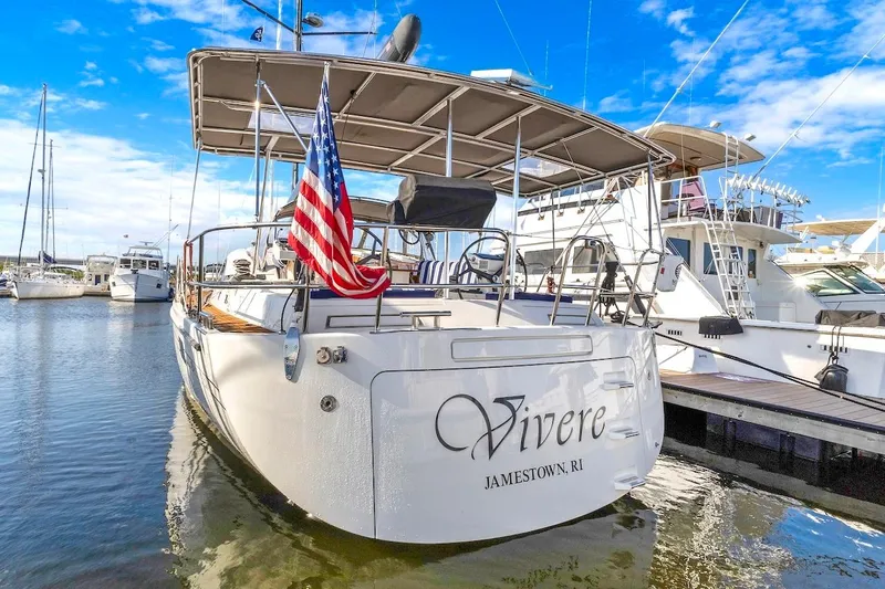 Slide: The Image of Sailing yacht "Vivere" docked, Southerly 57 RS, 2011 model, with American flag. - 4