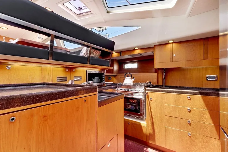 Slide: The Image of Luxurious interior of 2011 Southerly 57 RS yacht with modern kitchen amenities. - 40
