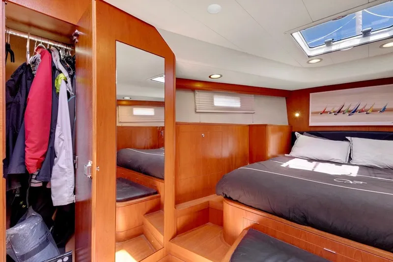 Slide: The Image of Luxurious cabin interior of 2011 Southerly 57 RS yacht with bed and wardrobe. - 47