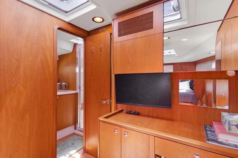 Slide: The Image of Interior of 2011 Southerly 57 RS yacht with wooden cabinetry and modern amenities. - 49