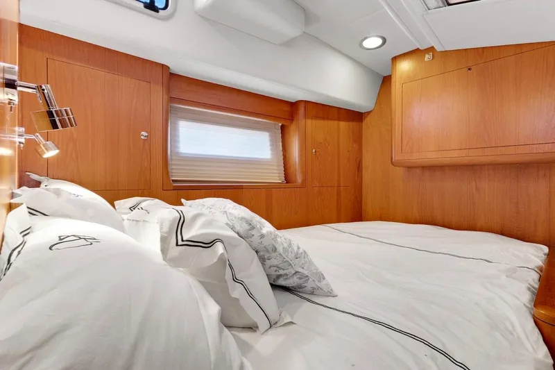 Slide: The Image of Luxurious cabin interior of 2011 Southerly 57 RS yacht with cozy bedding. - 53