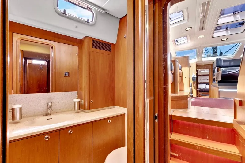 Slide: The Image of Luxurious interior of 2011 Southerly 57 RS yacht featuring wooden cabinetry and modern fixtures. - 55