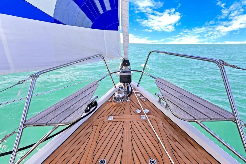 Slide: The Image of Bow view of 2011 Southerly 57 RS yacht sailing on turquoise sea under clear blue sky. - 8