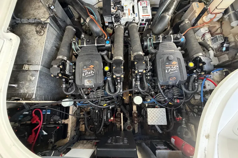 Slide: The Image of Engine compartment of a 2006 Sea Ray Sundancer 320 with twin MerCruiser engines. - 28