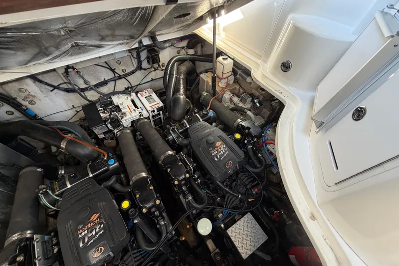 Slide: The Image of Engine compartment of a 2006 Sea Ray Sundancer 320 boat, showcasing dual engines. - 29