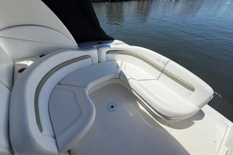 Slide: The Image of Luxurious seating on 2006 Sea Ray Sundancer 320 yacht, overlooking calm waters. - 7