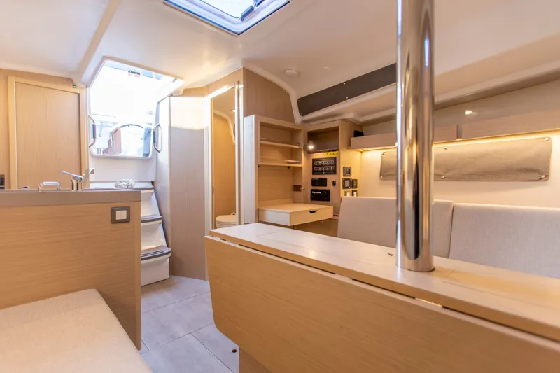 Slide: The Image of Interior of 2026 Beneteau Oceanis 34.1 yacht with modern amenities. - 11