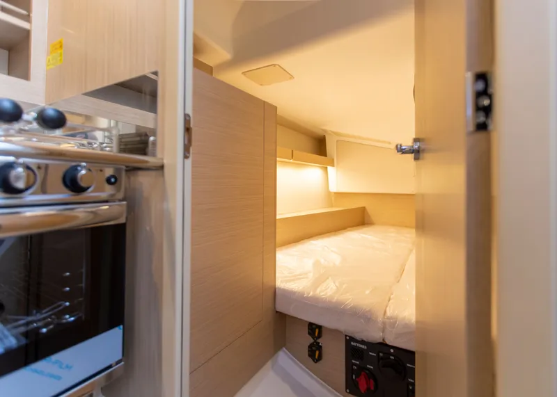 Slide: The Image of Interior of 2026 Beneteau Oceanis 34.1 yacht with cozy sleeping area. - 14