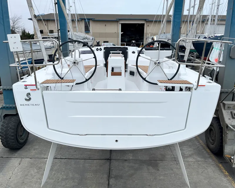 Slide: The Image of Beneteau Oceanis 34.1 2026 in dock with dual steering wheels. - 3