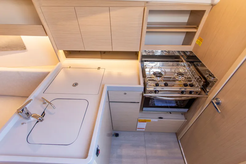Slide: The Image of Interior of Beneteau Oceanis 34.1 yacht, modern kitchen, year 2026. - 5