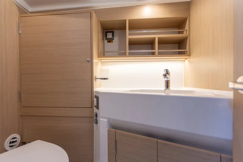 Slide: The Image of Interior of Beneteau Oceanis 34.1 yacht, bathroom view, year 2026. - 7