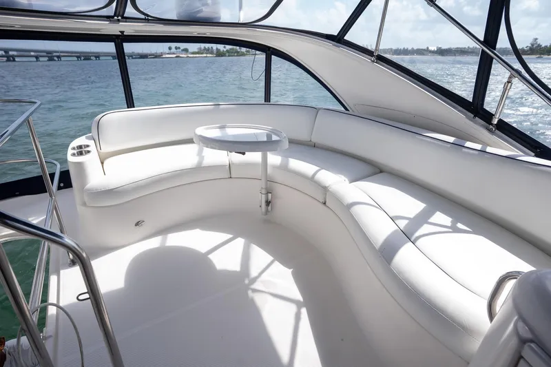 Slide: The Image of Luxurious seating area on a 2009 Meridian 391 Sedan yacht with ocean view. - 21